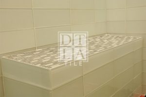 Bathroom glass tile bench in Malibu shower