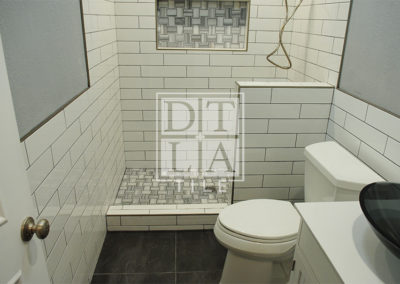 Compton bathroom tile floor and wall