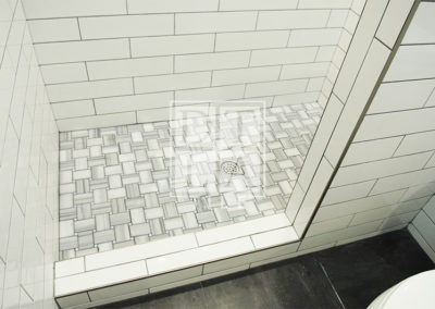 Floor mosaic in Compton bathroom