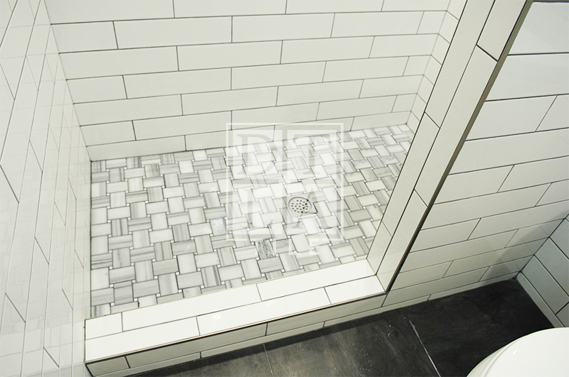 Floor mosaic in Compton bathroom