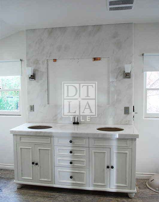 Installation of marble countertop & bathroom backsplash in Hollywood