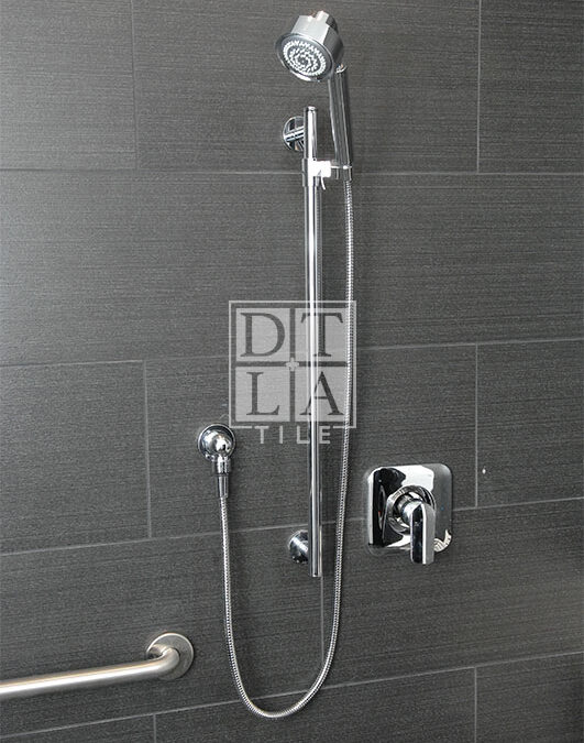 Closeup view of Emser SPECULAR SYRMA wall tiles in shower