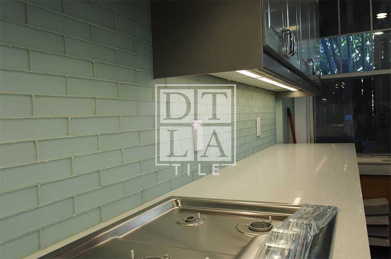 Different angle view of tile installation using glass tiles