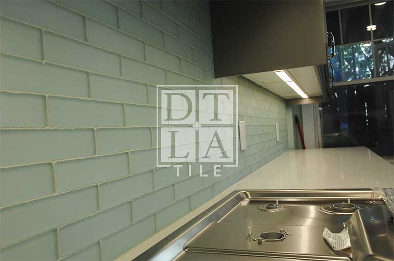 This is a side view of the glass tile kitchen tile installation