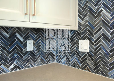 Kitchen Backsplash Tile Installation with Herringbone Abruzzo Silk