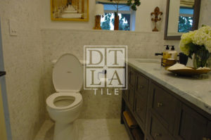 Toilet Wall with Bianco Bello Penny Round Tiles