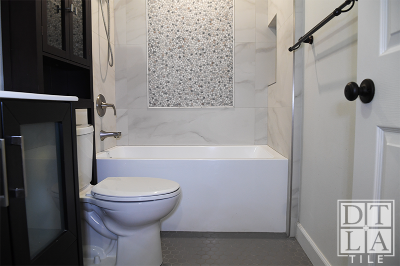 install new tub and surround Inglewood with corner flush niche